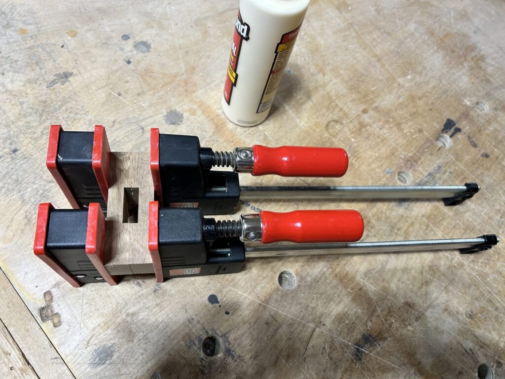 Gluing and clamping mallet head with parallel-jaw clamps