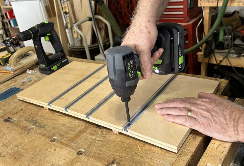 Screw the T-track into the dadoes