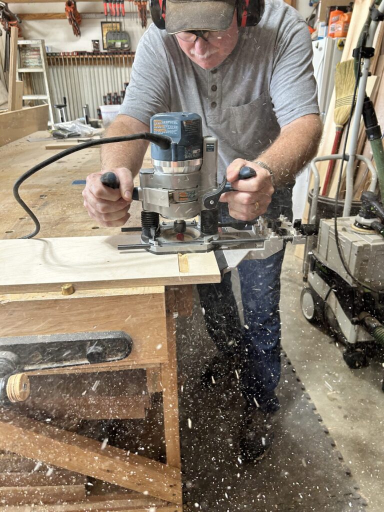 Routing a wide slot in the base for the T-bolts