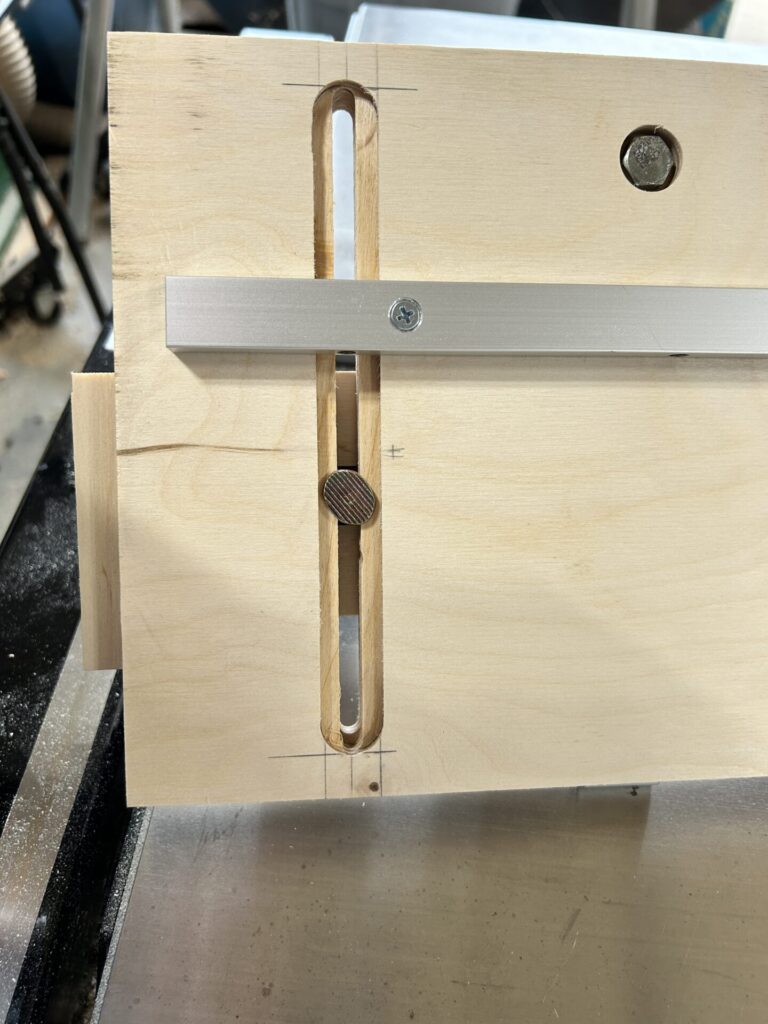 Reinstall the miter bar and secure the guide to the base with T-bolts